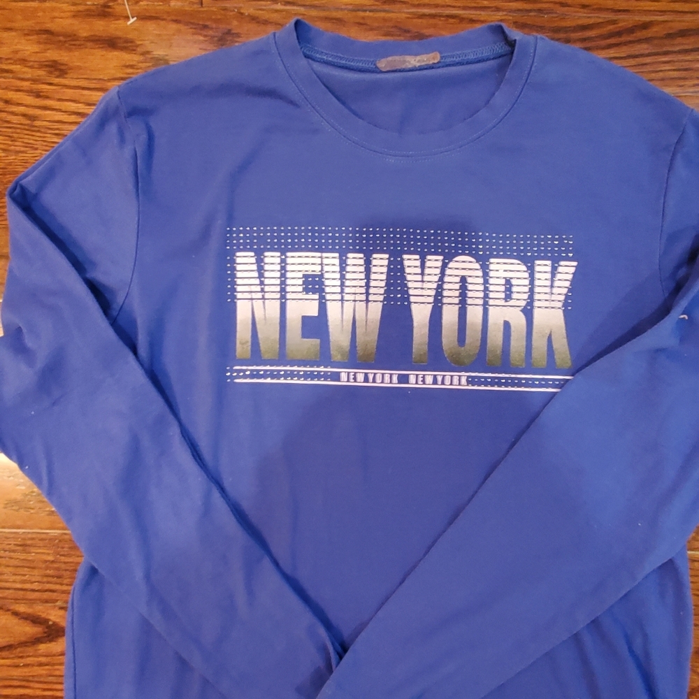 Long sleeve blue New York t-shirt.